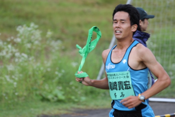 走る選手